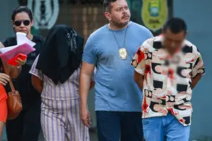 Casal preso por suspeita de tortura e assassinato (Foto: Reprodução)