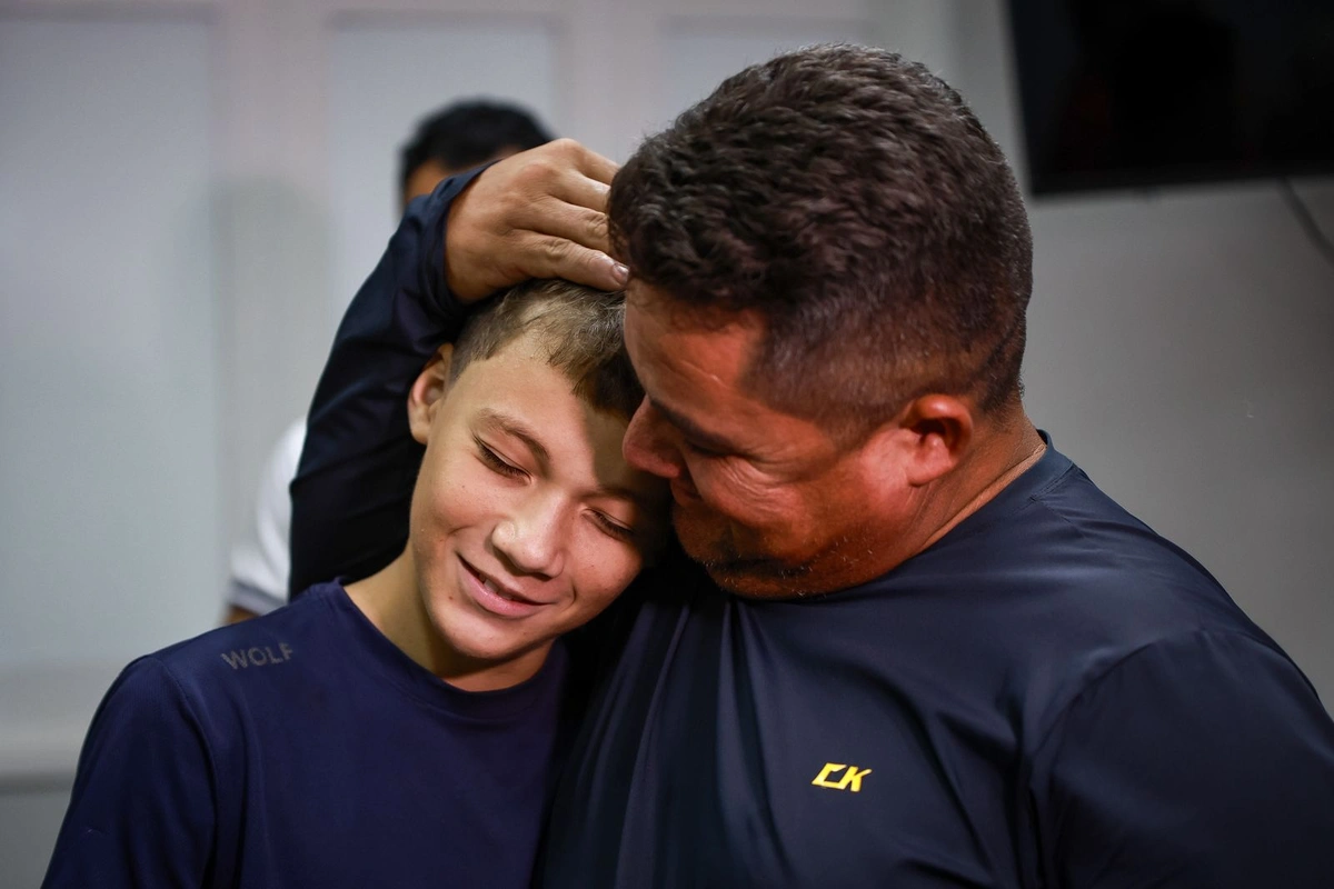 O adolescente e o pai Almerindo Carvalho